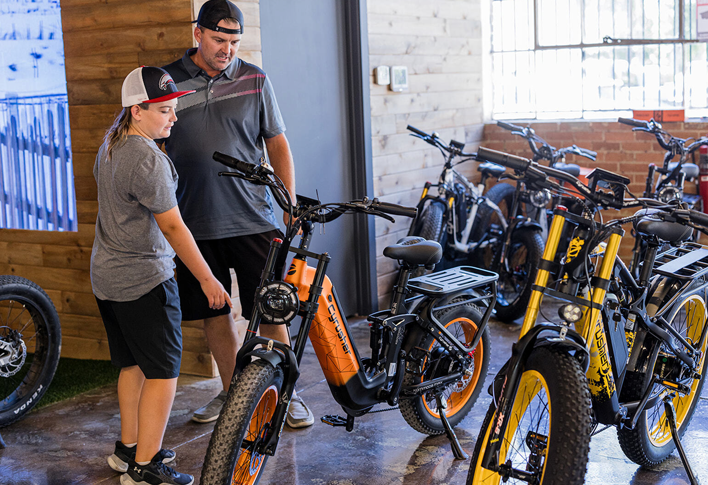 Cyrusher e-bikes displayed inside the Salt Lake City store