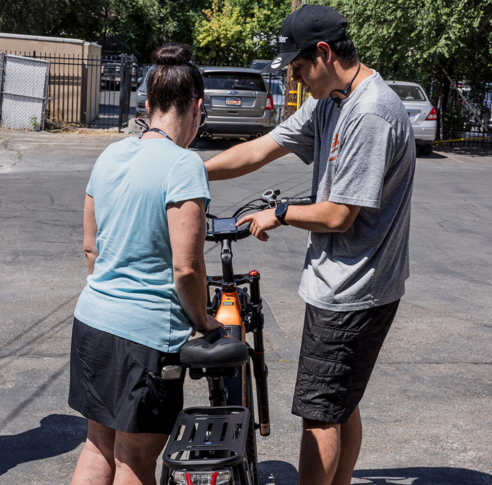 Hands-on guidance before a test ride.